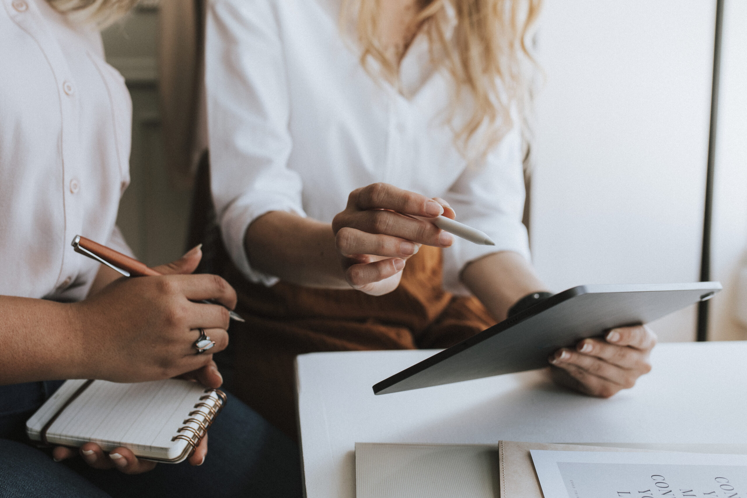 Business people working with a digital tablet in a meeting