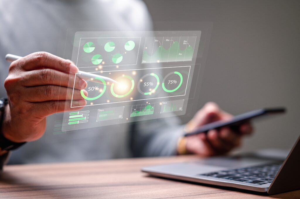 man using holographic display to work on statistics 