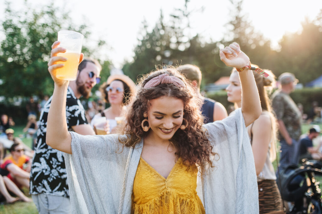 woman celebrating at a festival