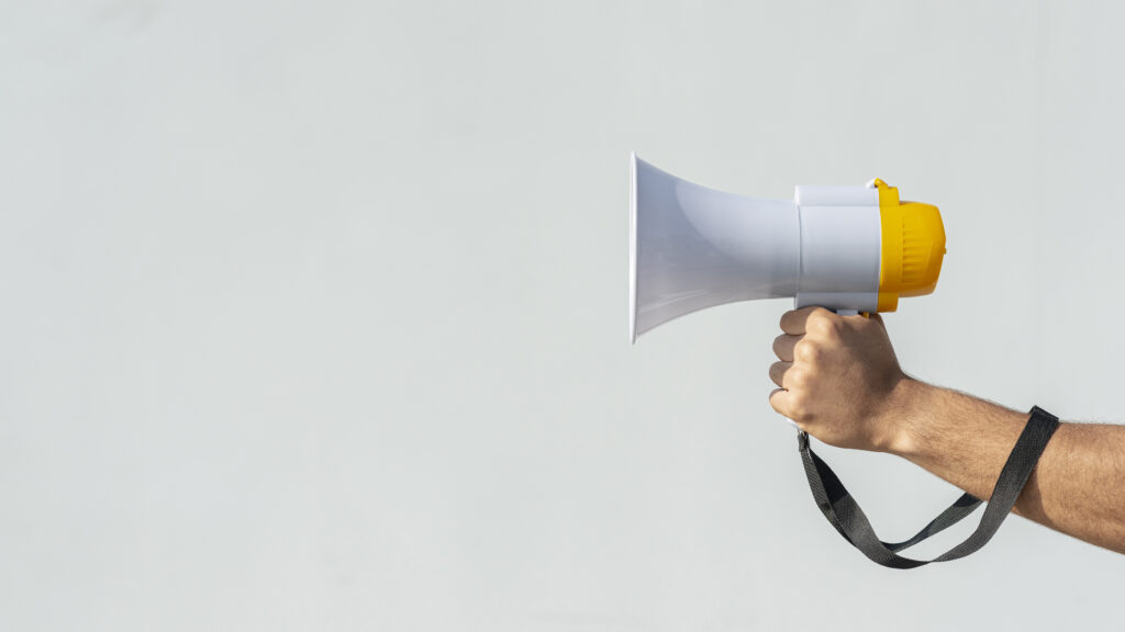 man holding megaphone