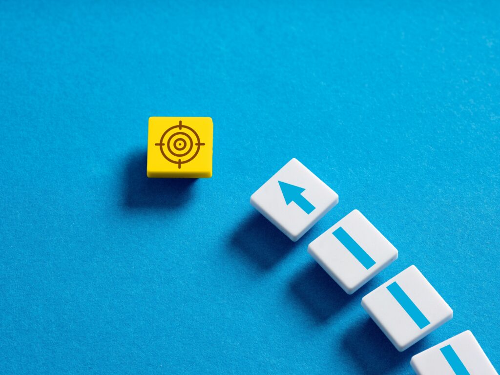 arrow on tiles pointing at a target on a yellow tile 